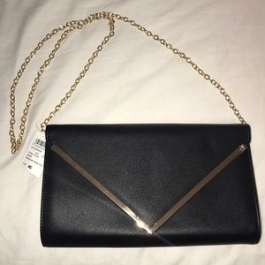 Purse with gold chain strap